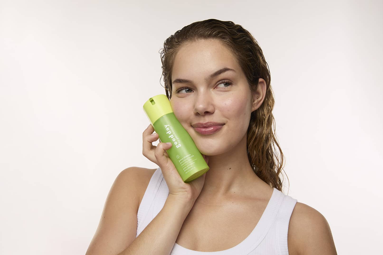 juice cleanse double cleanse makeup remover woman using