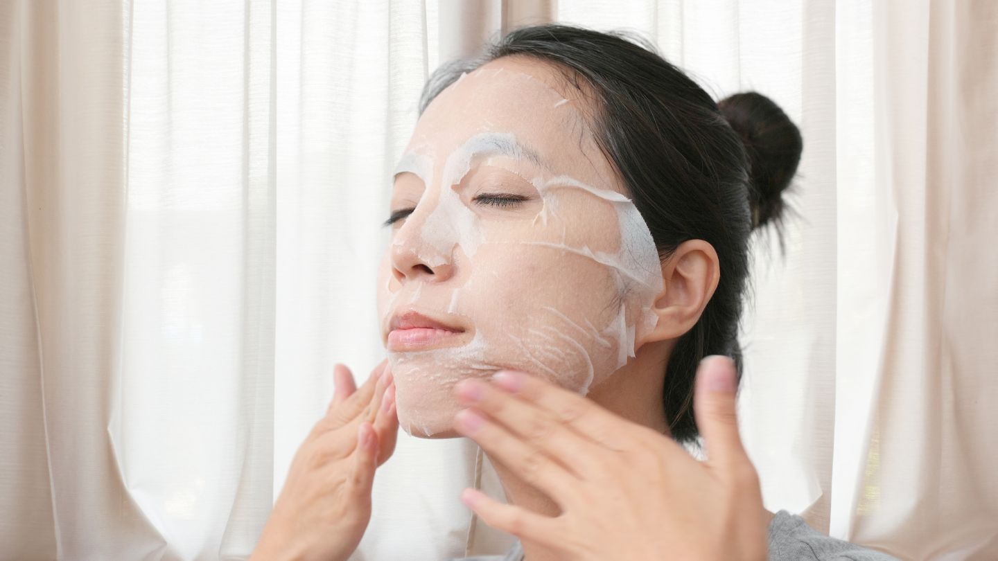 woman wearing hydrating face mask nourishing skin glass skin face