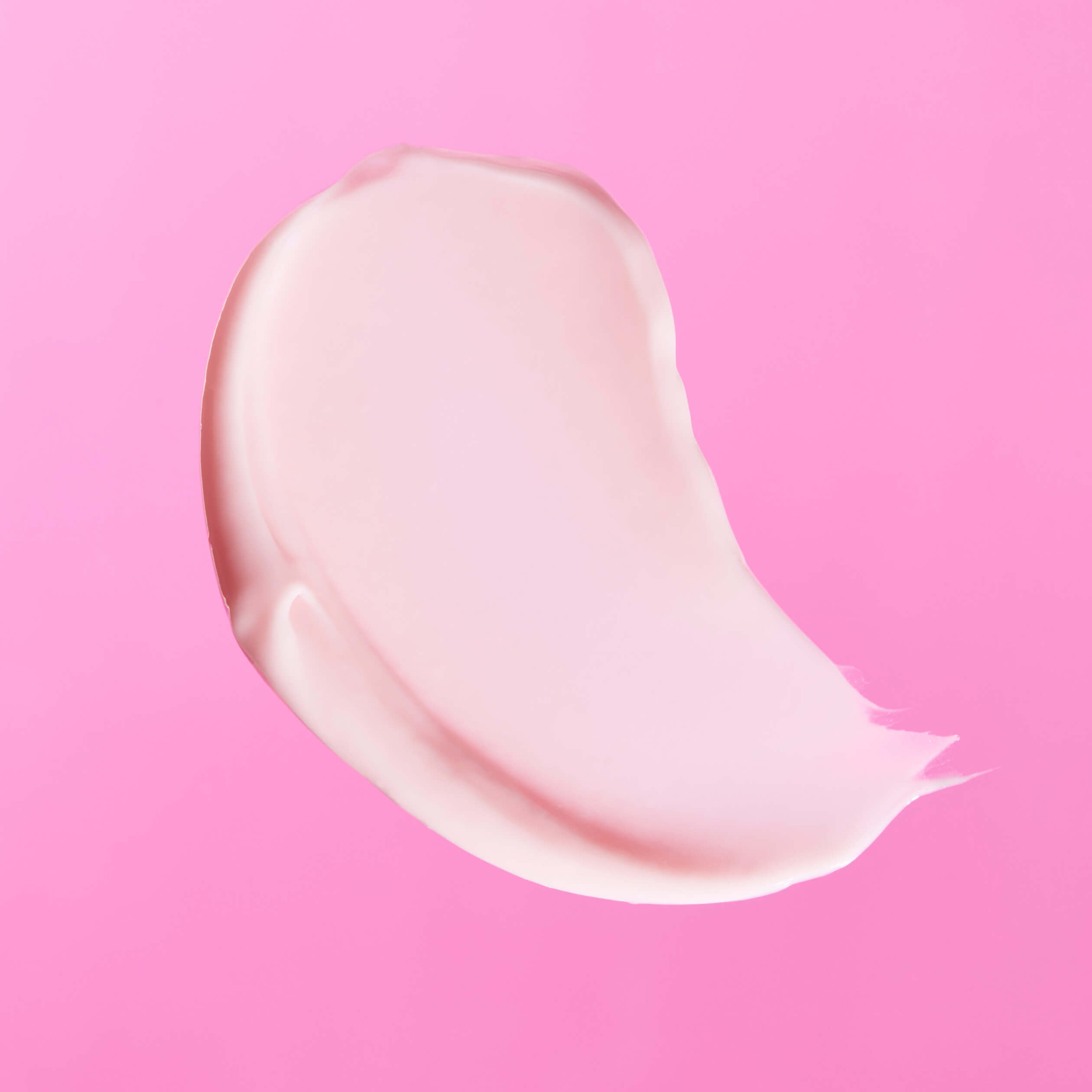 nine-to-five moisturizer on a bright pink background