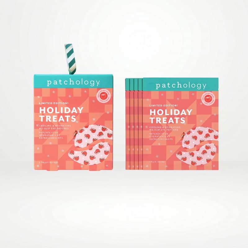 Holiday chocolate mug eye masks packaging on a clean white background, showing a single box with a striped straw and a stack of matching boxes.