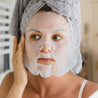 woman wearing the good fight sheet mask patchology