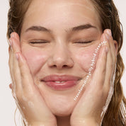 woman using juice cleanse with double cleanse makeup remover