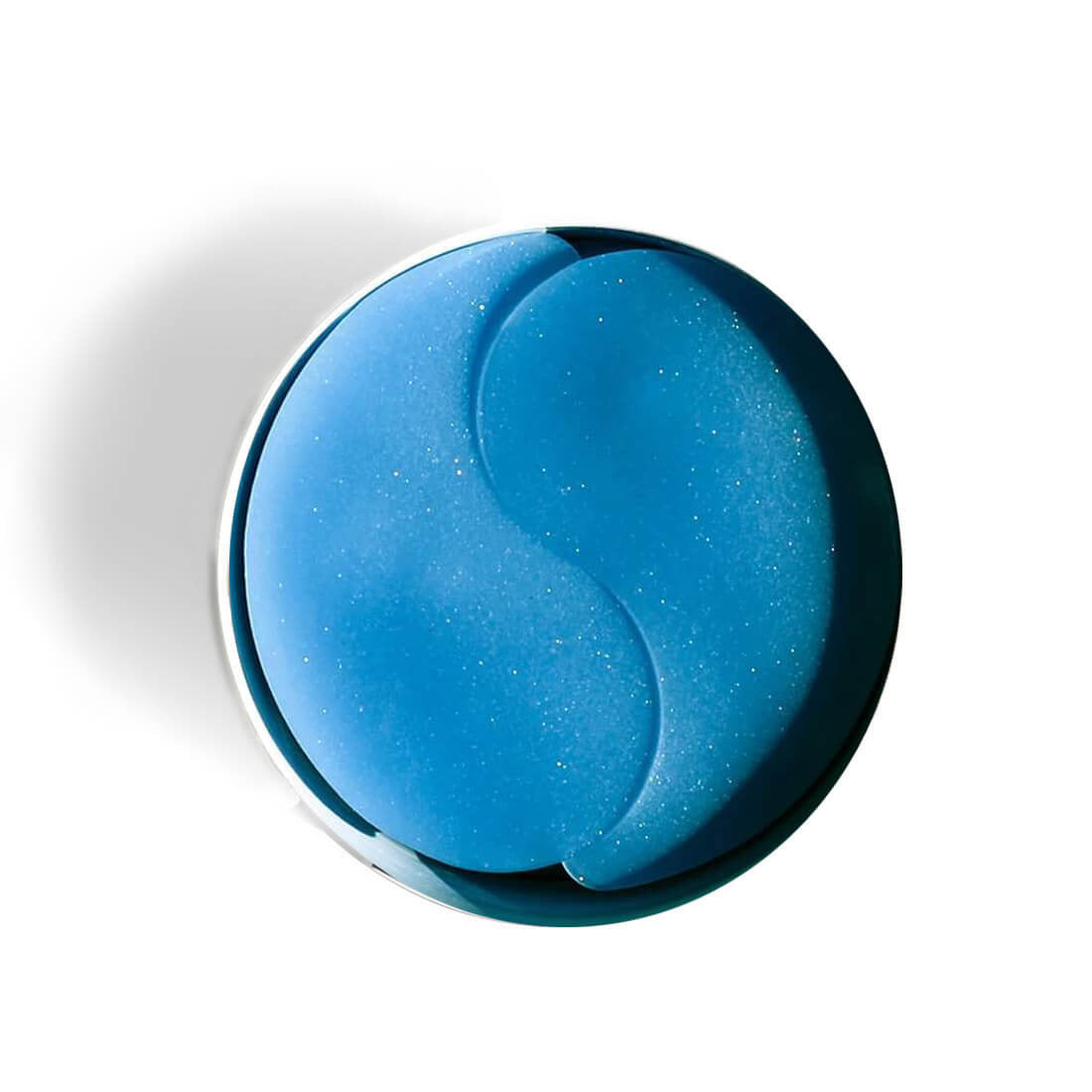 Restoring Night smoothing fine lines eye patch with subtle shimmer in round shape, isolated on white background for eye care treatment