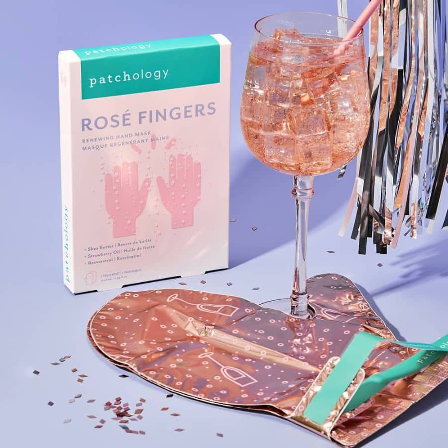 patchology rosé fingers packaging with a purple background and a glass of rose wine